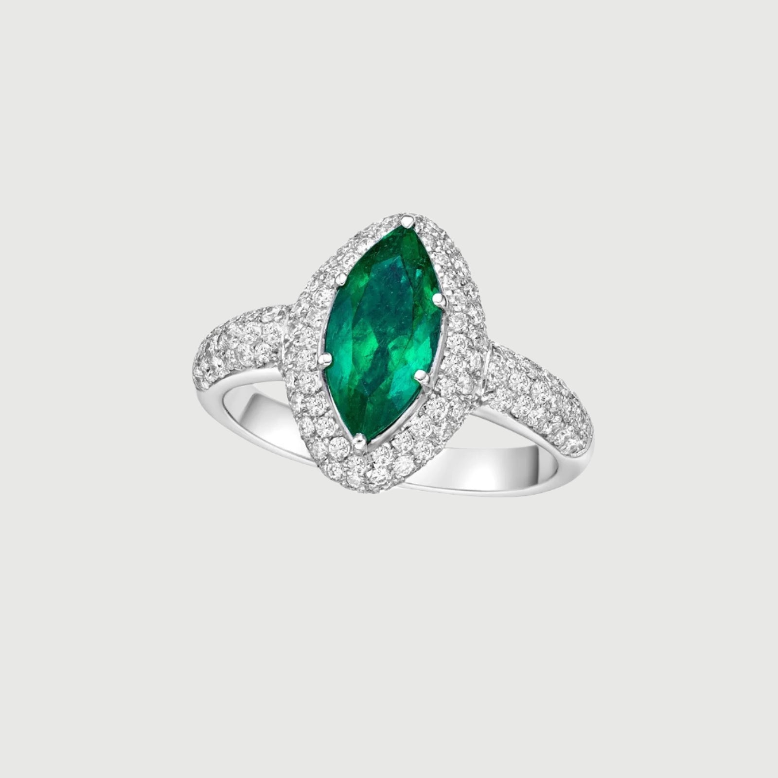 Ring with marquise cut Colombian VG emerald and diamonds in platinum